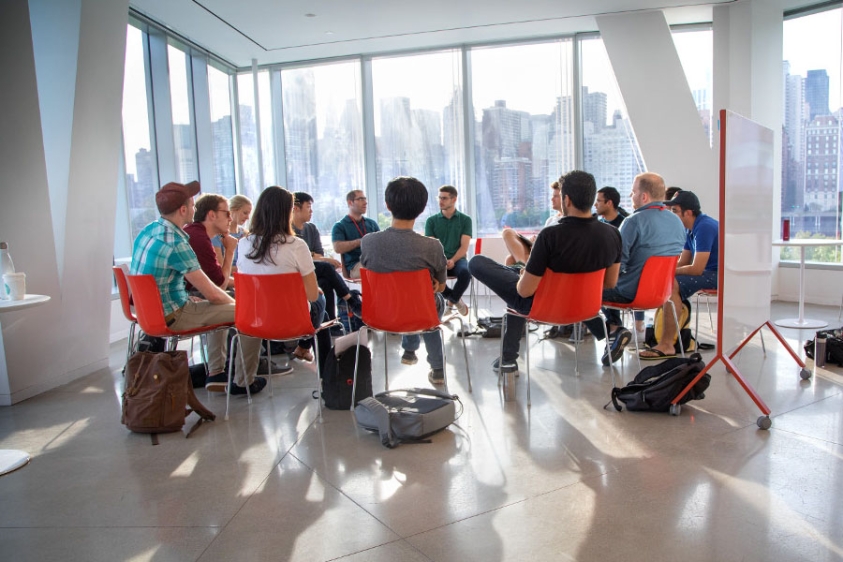 Students seated in a circle