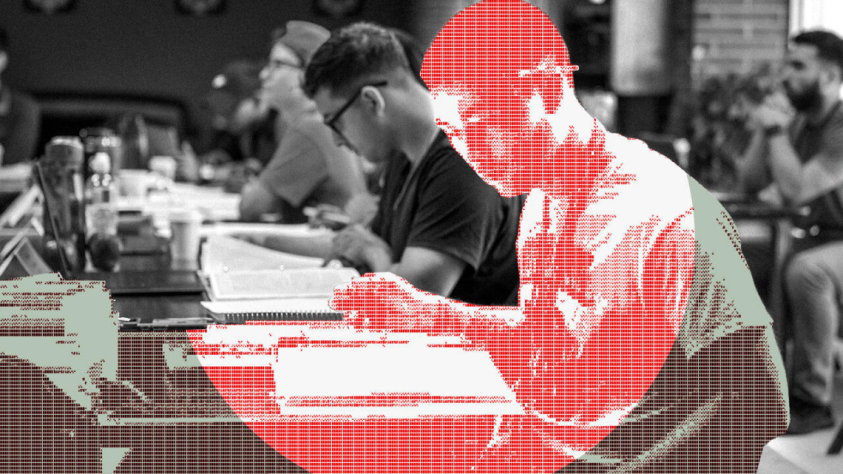 Stylized illustration of a student sitting at a desk reading