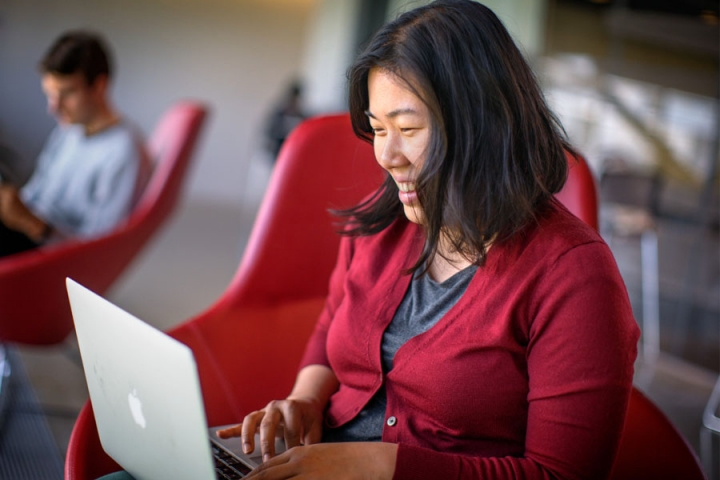 A student working on their laptop