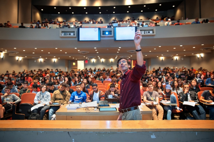 Faculty lecturing in a large classroom