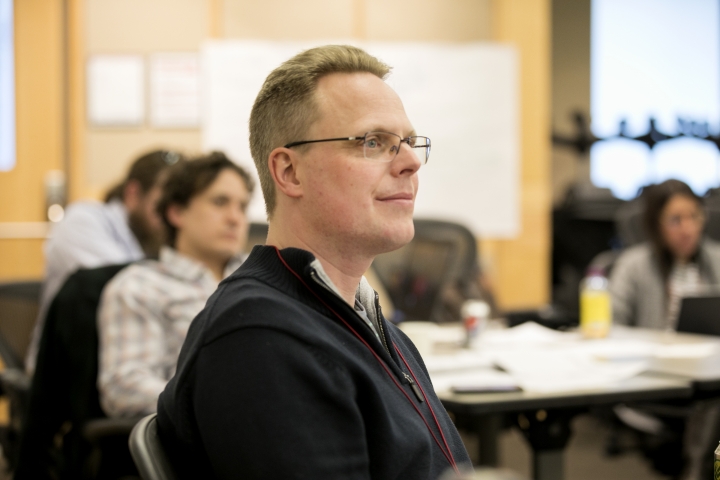 Faculty listening intently