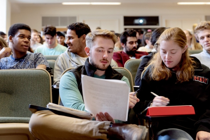 Students sit in a classroom
