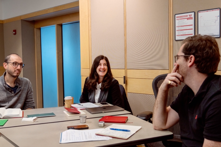 New Cornell faculty members participate in a group discussion during the workshop.