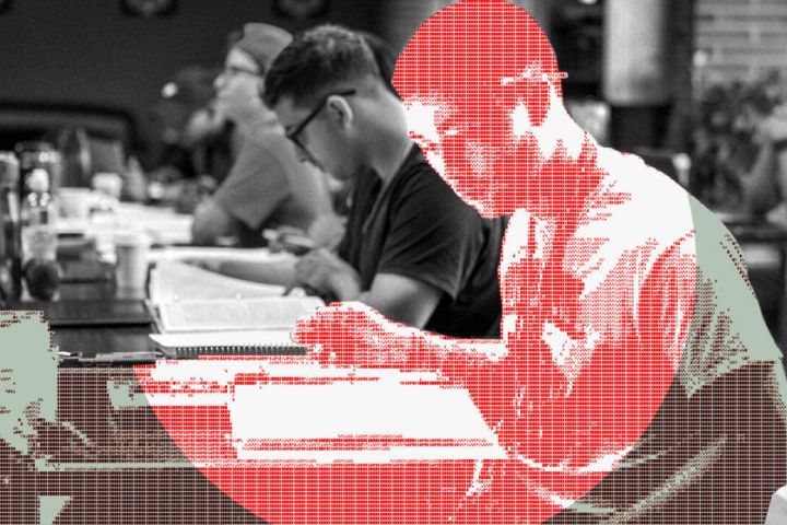 Stylized illustration of a student sitting at a desk reading